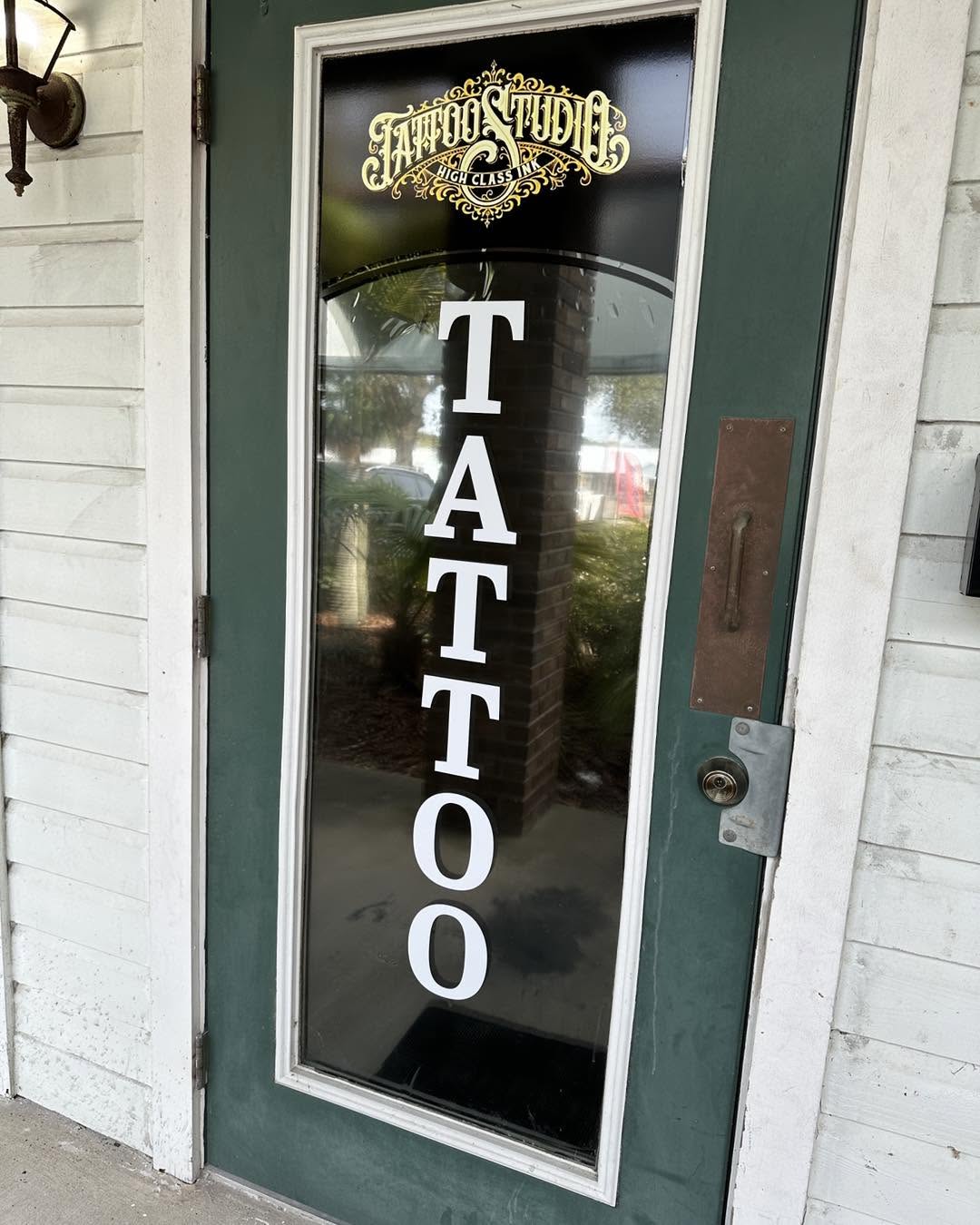 Tattoo studio door graphics